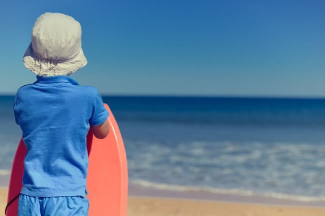 A boy and his bodyboard