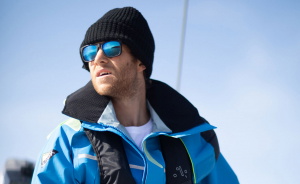 Man sailing in sunglasses and a hat