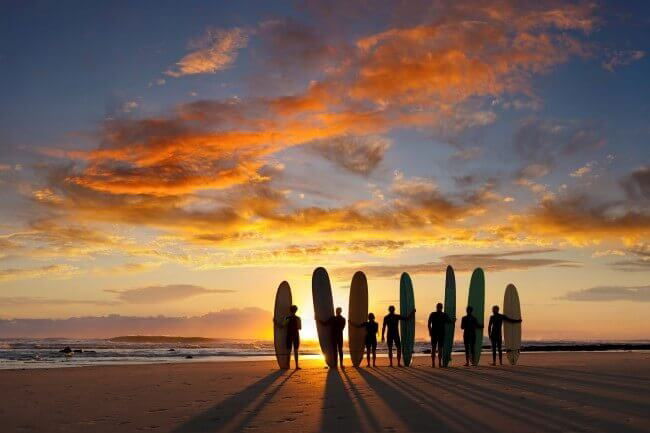 Surfers with their boards